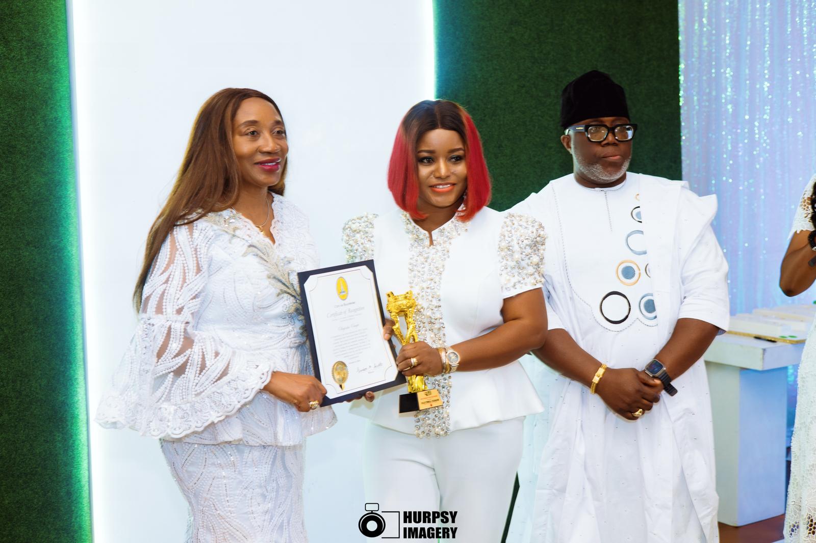 NIBAD 2025 award presentation with a winner and event hosts